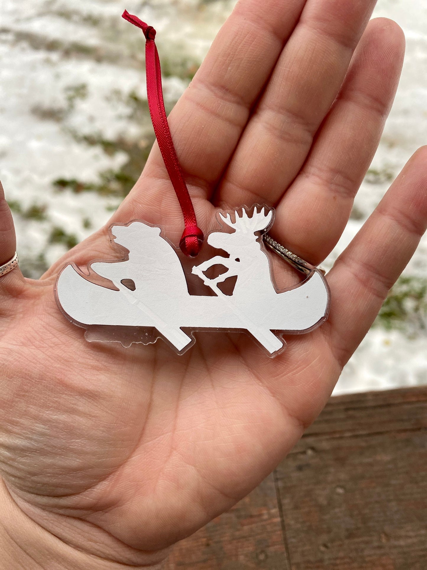 Moose and bear in canoe acrylic ornament