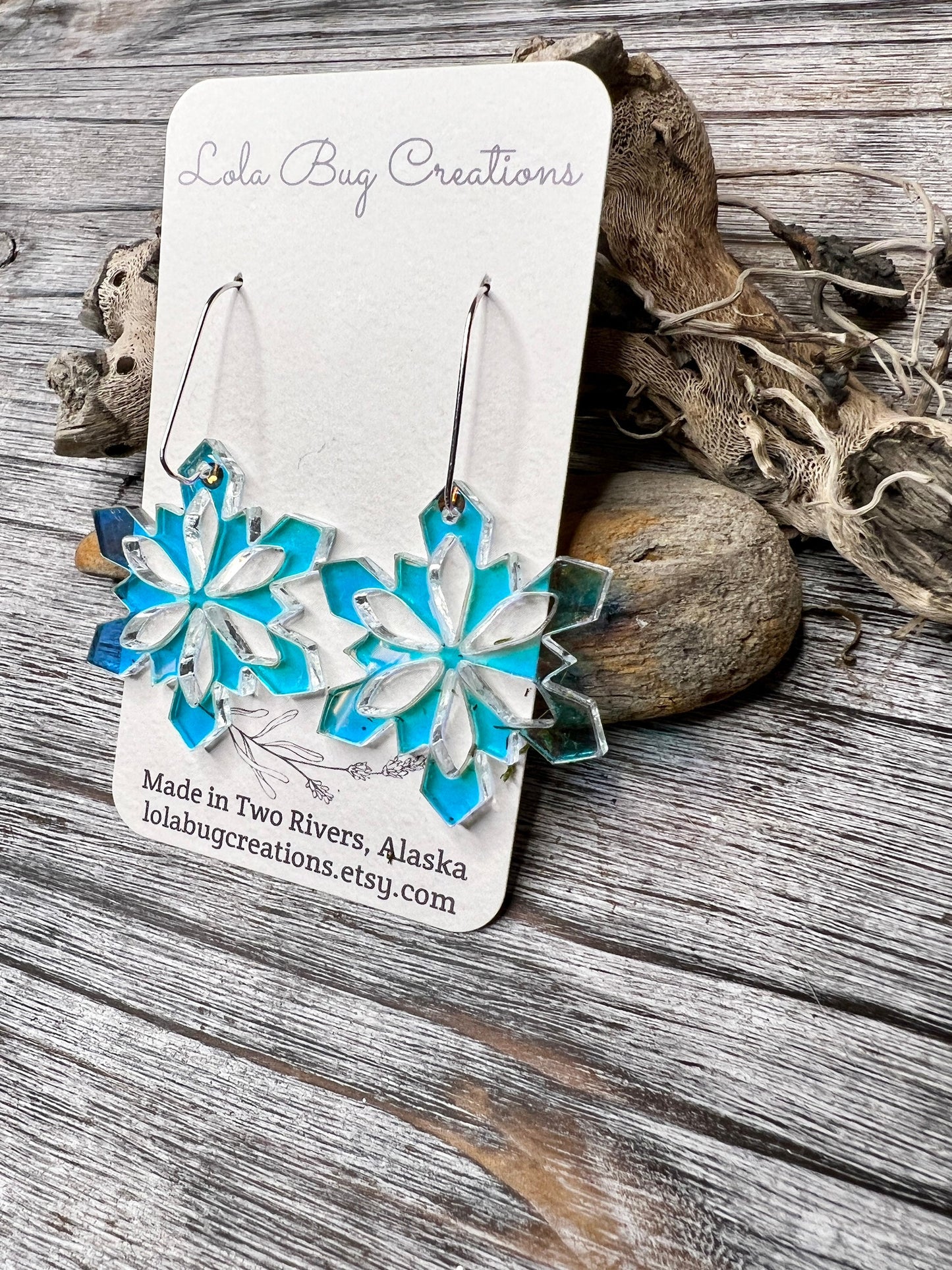 Iridescent snowflake acrylic earrings with sterling silver ear wires
