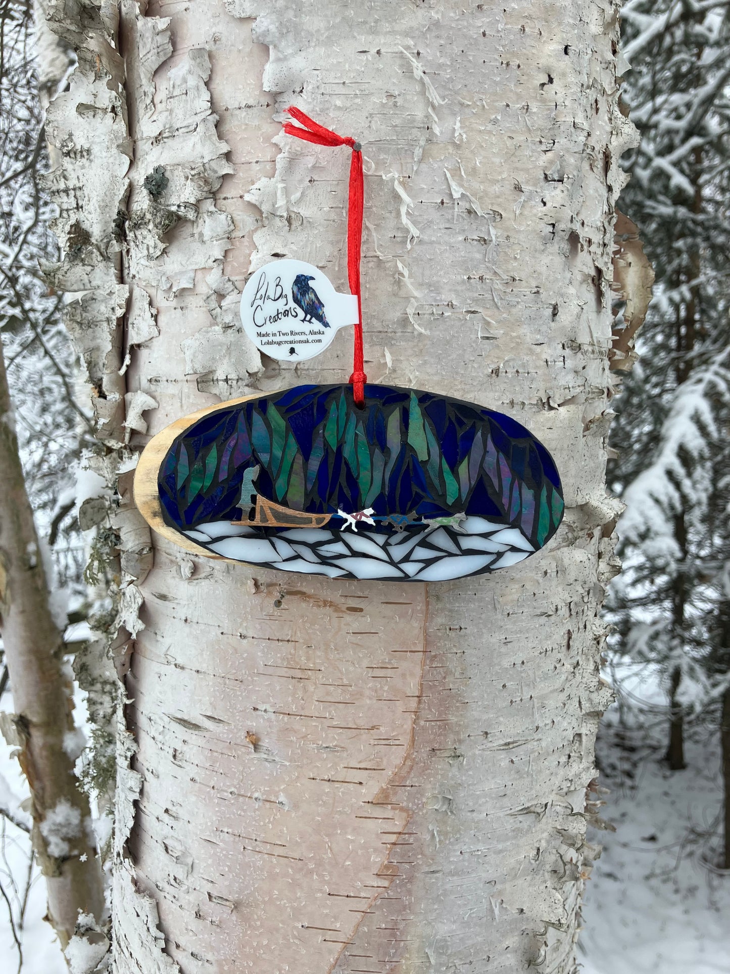 Northern Lights dog mushing team birch mosaic glass