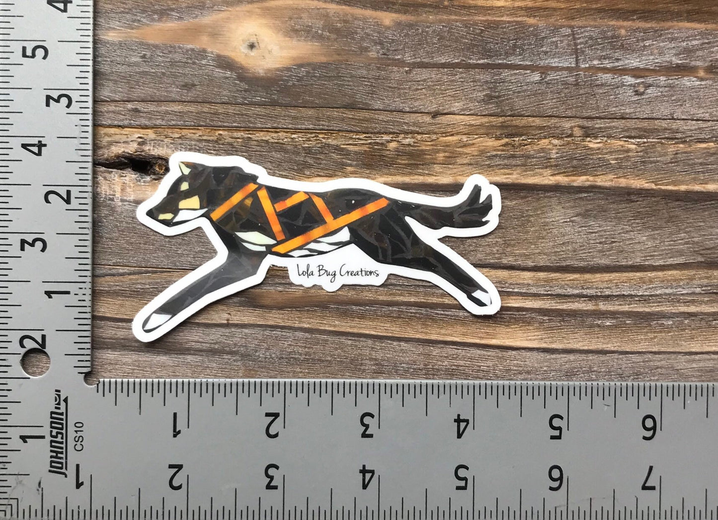 Running husky vinyl sticker