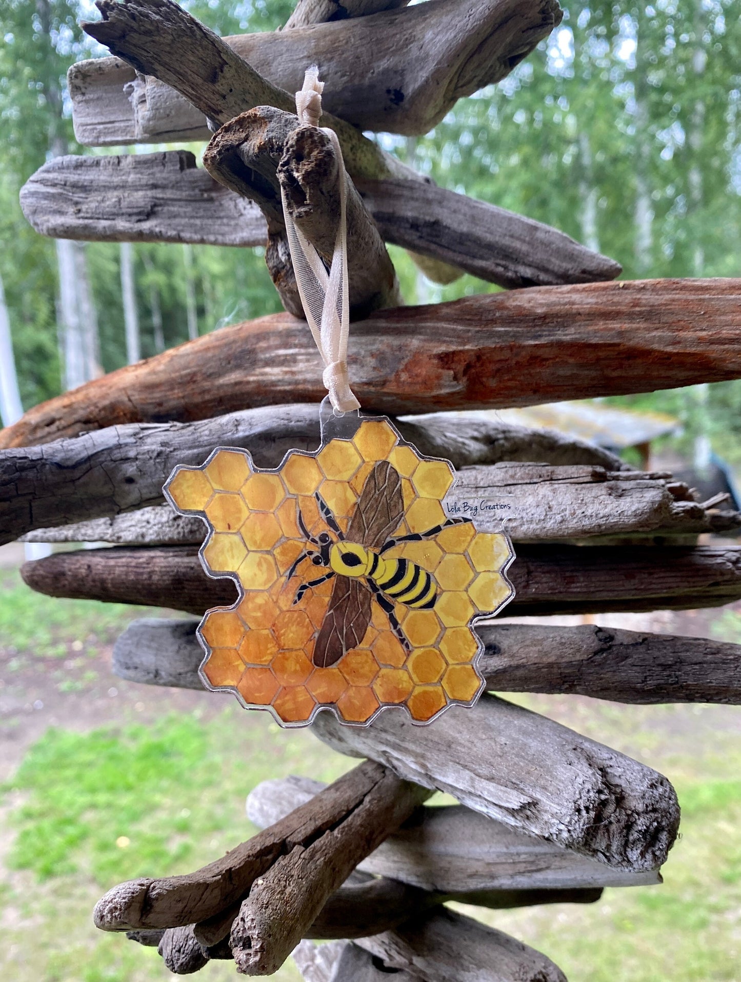 Bee on honeycomb acrylic ornament